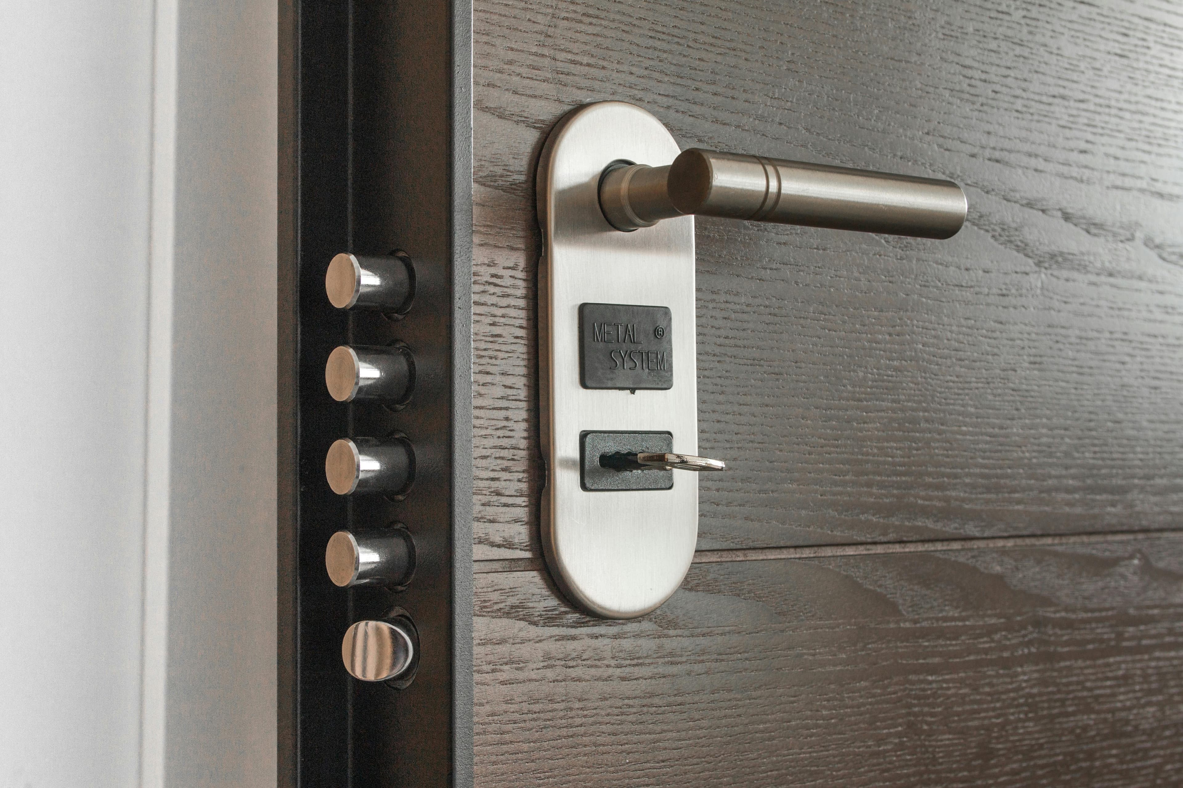 Commercial door with high-security hardware